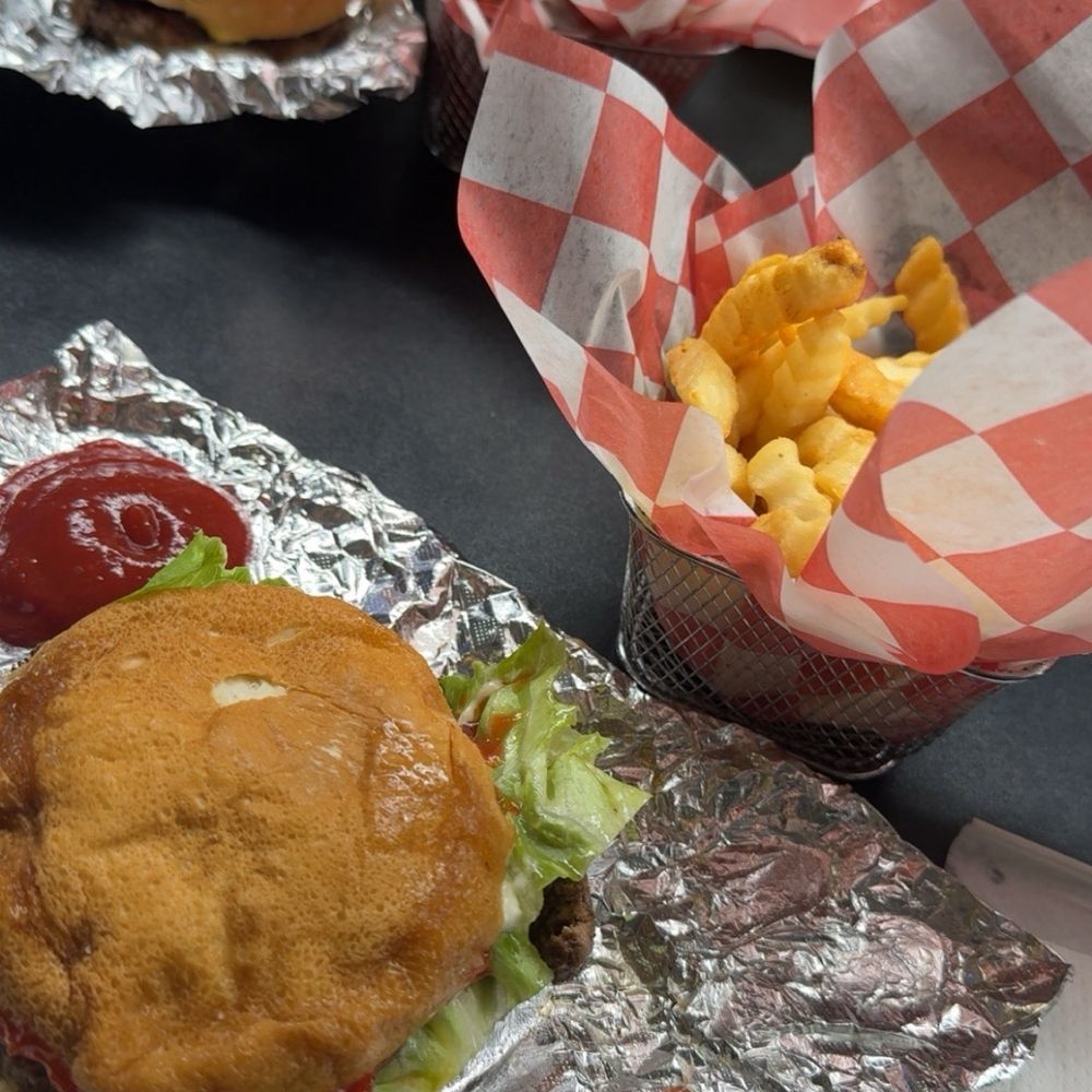Wimpy burger regular fries, bacon burger and Cajun fries Wimpy burger regular fries, bacon burger and Cajun fries