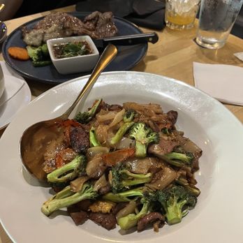 Hiso - Beef Pad See Ew (Mild Spice) and Lao Ribeye Steak - Laotian Near Me - Sacramento, California Hiso - Beef Pad See Ew (Mild Spice) and Lao Ribeye Steak - Laotian Near Me - Sacramento, California