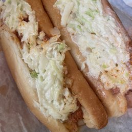 two hot dogs with coleslaw two hot dogs with coleslaw