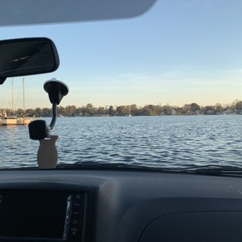 Proof - I didn't take a view from the restaurant(oops) but we parked right next to it! Literally on the water! - Italian Near Me - Elizabeth City, North Carolina