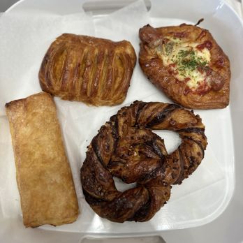 Tous Les Jours - Sausage onion pastry (TR), Pumpkin filled pastry (TL), salt butter roll (BL), and Chocolate Almond Pretzel (BR) - Coffee & Tea Near Me - Oklahoma City, Oklahoma Tous Les Jours - Sausage onion pastry (TR), Pumpkin filled pastry (TL), salt butter roll (BL), and Chocolate Almond Pretzel (BR) - Coffee & Tea Near Me - Oklahoma City, Oklahoma