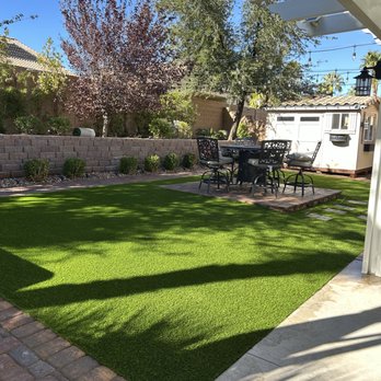 SkyWall Landscape - Artificial turf installation creating a clean, green, and low-maintenance backyard space, designed for comfort and everyday use. - Landscaping Near Me - Las Vegas, Nevada
