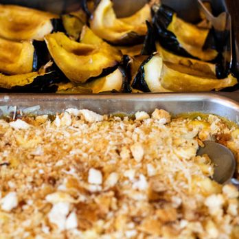 Erika Tauriello Professional Catering - baked acorn squash with goodness to top - Caterers Near Me