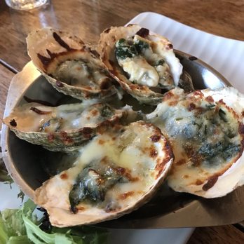 Bookstore & Restaurant - Oyster' Rockefeller, melted butter underneath the oys - Seafood Near Me - Wellfleet, Massachusetts Bookstore & Restaurant - Oyster' Rockefeller, melted butter underneath the oys - Seafood Near Me - Wellfleet, Massachusetts
