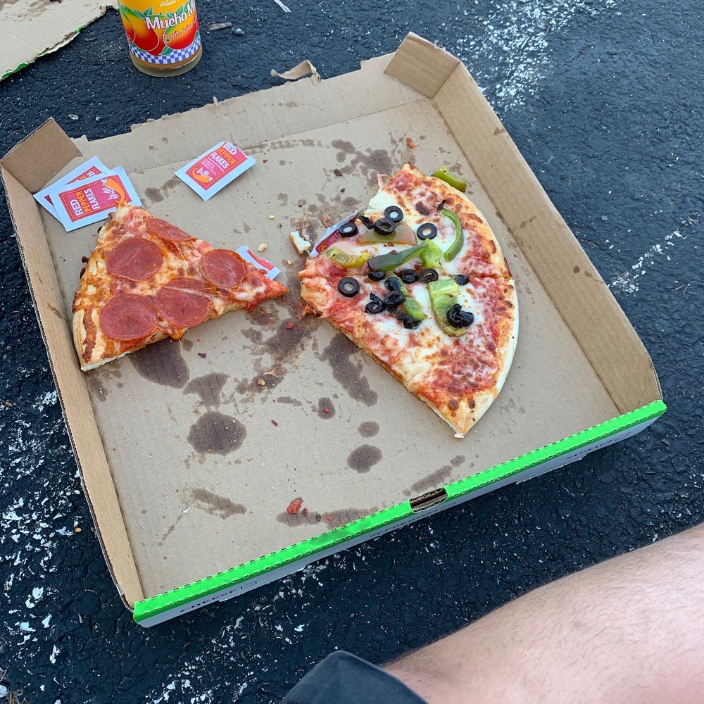 Pizza half green peppers and olives and half pepperoni Pizza half green peppers and olives and half pepperoni