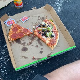 Pizza half green peppers and olives and half pepperoni Pizza half green peppers and olives and half pepperoni