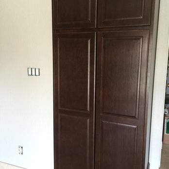 Gaio Contracting - Utility cabinet trimmed with precision to fit in this unique 36" x 80" cove. - General Contractors Near Me - Peoria, Arizona