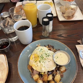 First Watch - The holiday menu special, eggs and steak hash! Very tasty, the parmesan sauce was delectable. - Breakfast & Brunch Near Me - Allen, Texas