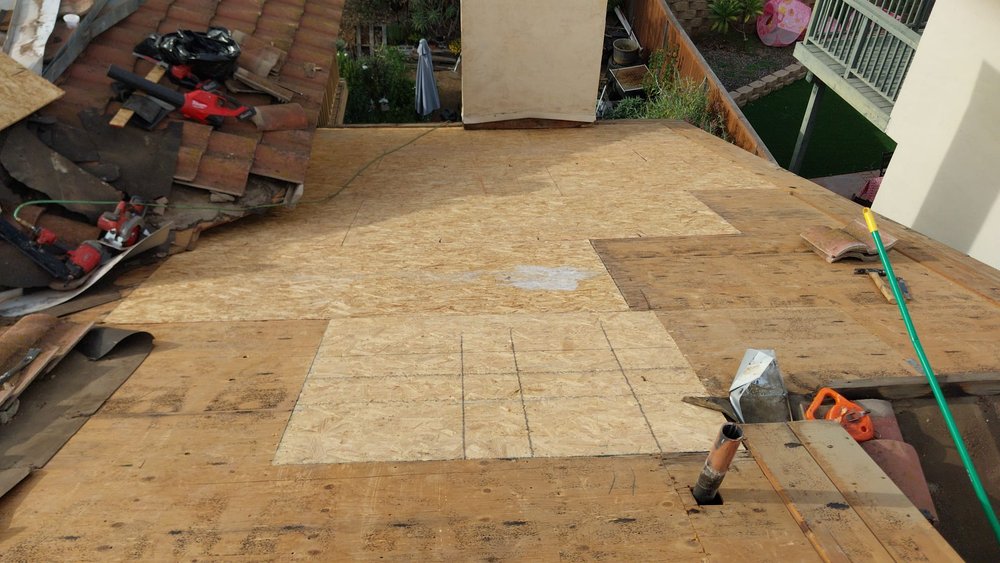 Slide of Tello's Roofing