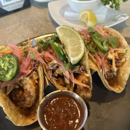 Cajun shrimp tacos, side of grilled broccolini.