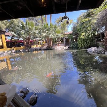 El Encanto - Window view of the pond. - Mexican Near Me - Cave Creek, Arizona