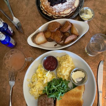 Hillside Farmacy - Egg & Sausage Breakfast Sammy and Buttermilk Pancakes - New American Near Me - Austin, Texas