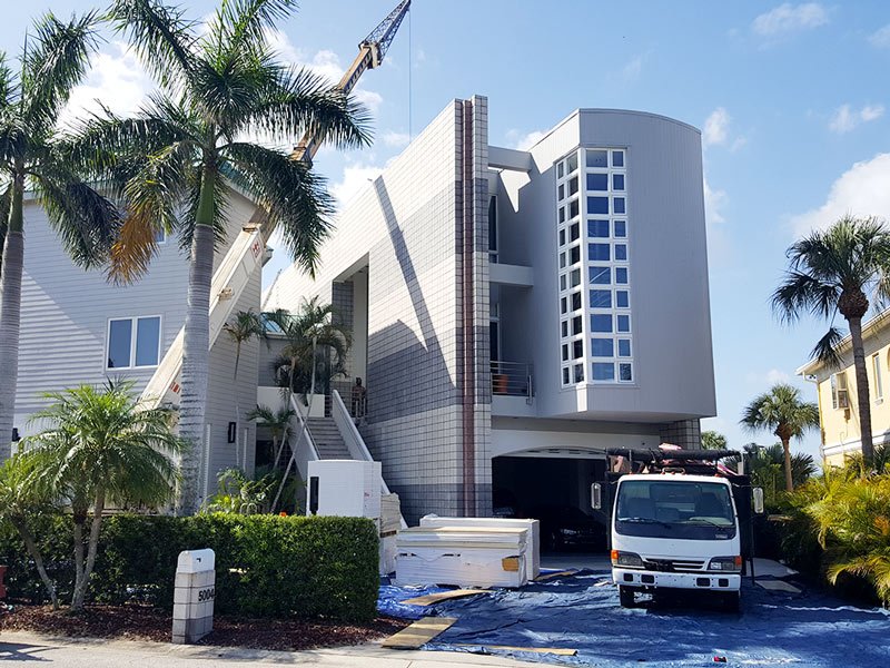 Slide of AKVM Roofing