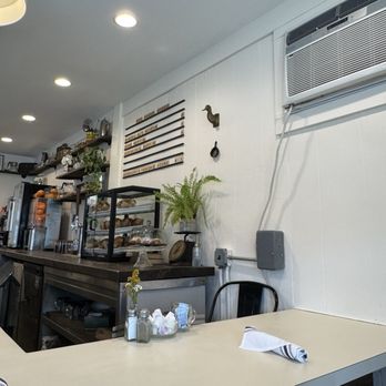 Ann & Fran's Kitchen - Counter seating that shows their pastry selection and shows their juicer and cold brew tap! - Breakfast & Brunch Near Me - West Yarmouth, Massachusetts