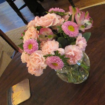 Publix - a vase of flowers on a table - Grocery Near Me - Roswell, Georgia