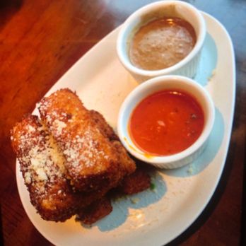 Yard House - Deep fried Mac and cheese with tomato bisque and some type of cream based sauce - New American Near Me - San Antonio, Texas Yard House - Deep fried Mac and cheese with tomato bisque and some type of cream based sauce - New American Near Me - San Antonio, Texas