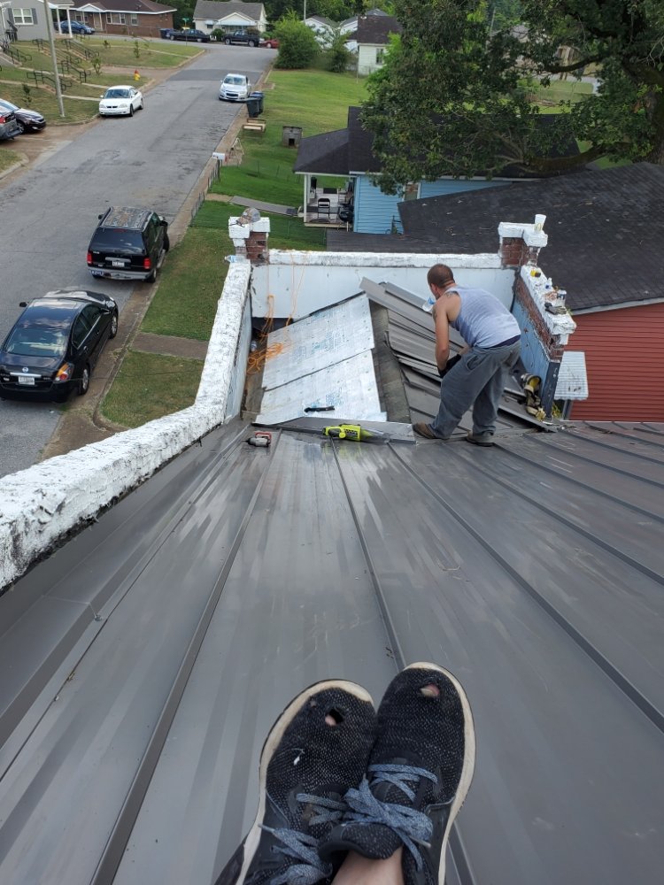 Slide of Powell's Roofing & Remodeling