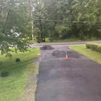 Nadeau Paving - a road with a pile of asphalt - General Contractors Near Me - Troy, New York