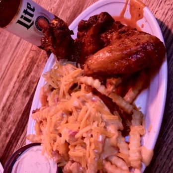 The Peanut - Cheese fries and wings. - Bars Near Me - Kansas City, Missouri The Peanut - Cheese fries and wings. - Bars Near Me - Kansas City, Missouri