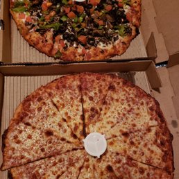 Medium thin crust cheese and medium build your own veggie with regular crust Medium thin crust cheese and medium build your own veggie with regular crust