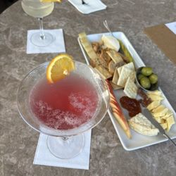 Lg cheese board, two cocktails; French 57? And a yummy cosmo