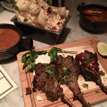Dishoom - clockwise: garlic naan, chicken ruby, lamb, house black daal. definitely try get the lamb! - Indian Near Me - London, XGL