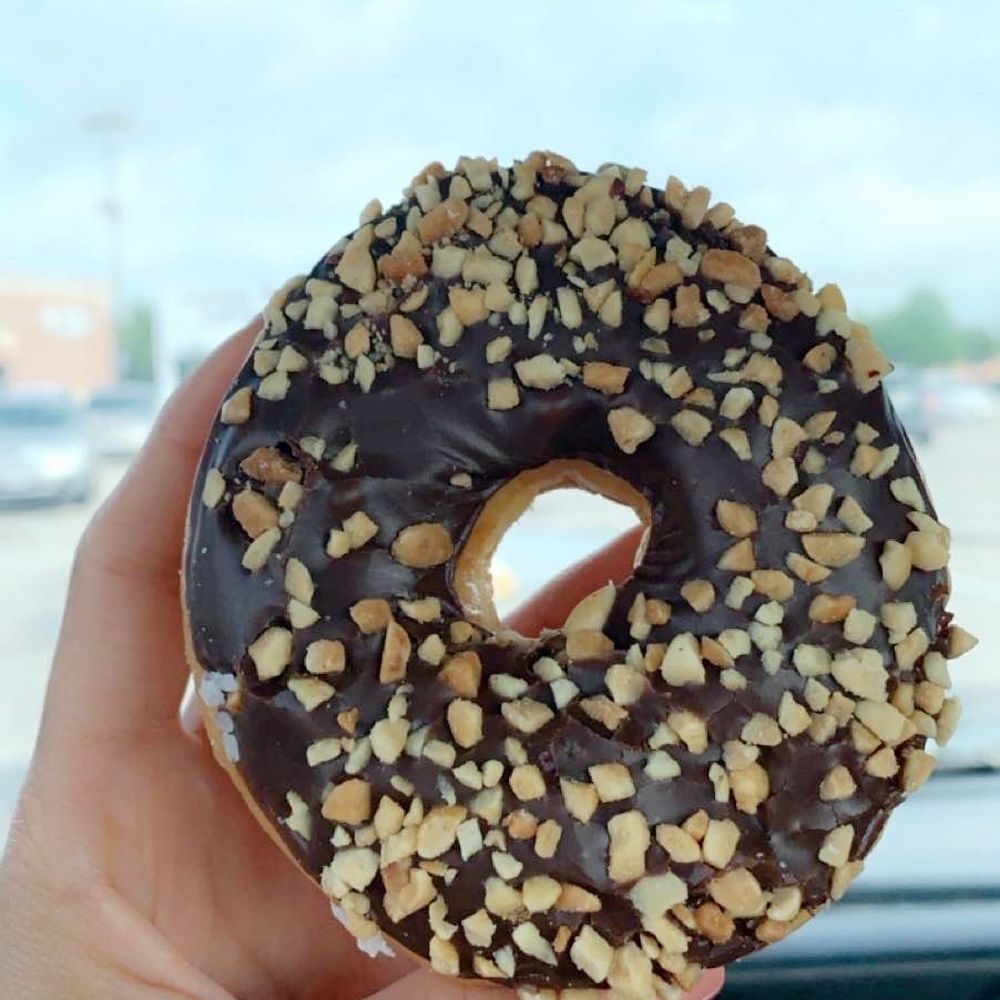 Angkor Donuts - Delicious chocolate glazed doughnut w/nuts. - Donuts Near Me - Katy, Texas