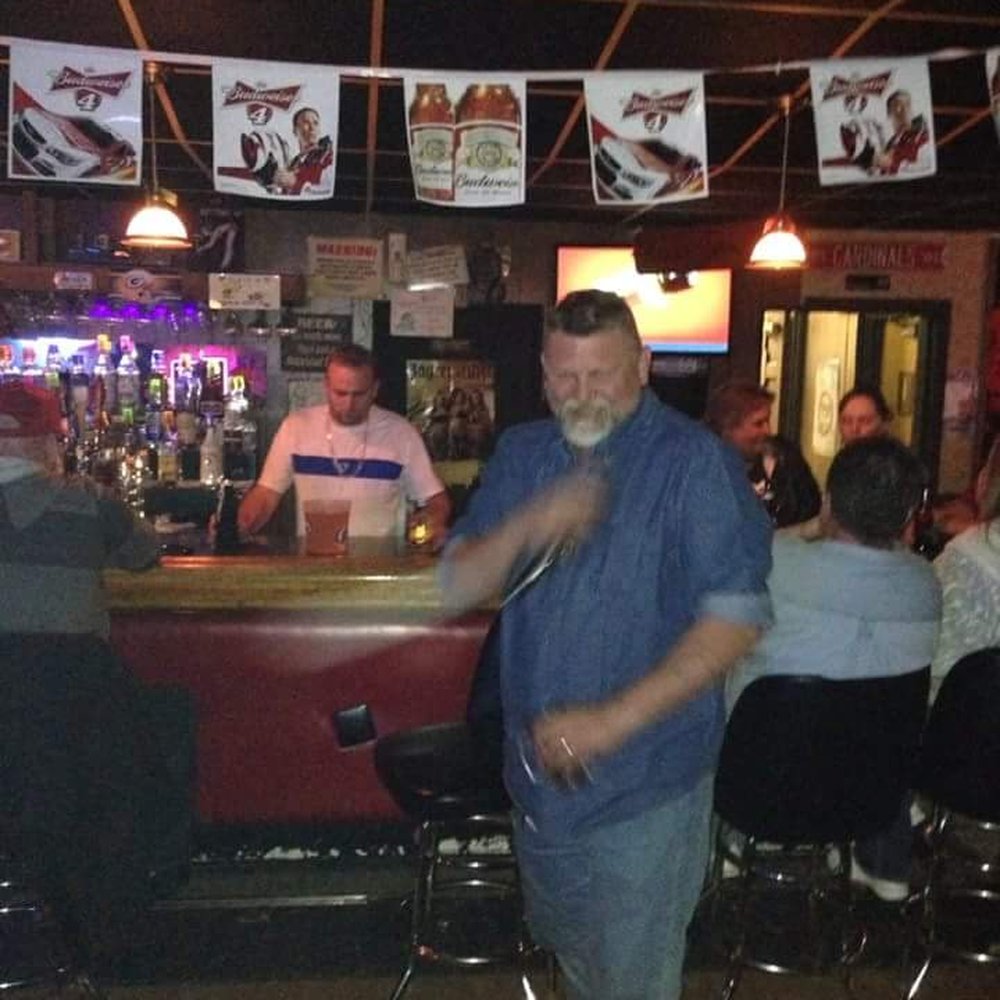 Sidetracker Lounge - a man standing at a bar - Nightlife Near Me - Saint Robert, Missouri