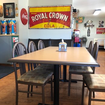Coldwater Cafe Sheffield - a table and chairs - Cafes Near Me - Sheffield, Alabama