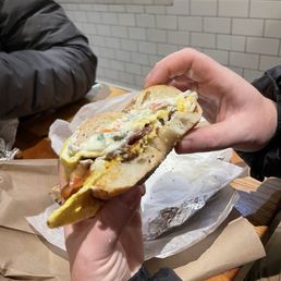 Bacon Egg Cheese on Sesame bagel w/ veggie cream cheese Bacon Egg Cheese on Sesame bagel w/ veggie cream cheese
