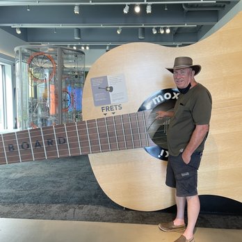 Moxi - My big kid seeing how a guitar works - Museums Near Me - Santa Barbara, California