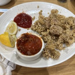 Horrible tasting Calamari and sauce. Even ketchup couldn't make this dish good.