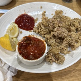 Carrabba's Italian Grill - Horrible tasting Calamari and sauce. Even ketchup couldn't make this dish good. - Italian Near Me - Atlanta, Georgia