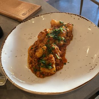 Gràcia Mediterranean - Calamari bolognese - Cocktail Bars Near Me - Austin, Texas Gràcia Mediterranean - Calamari bolognese - Cocktail Bars Near Me - Austin, Texas