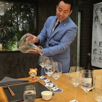 UKA - Sakè Sommelier, Shōta, pouring Kuhèiji, high premium Sakè (sah keh) from a decanter. - Japanese Near Me - Los Angeles, California