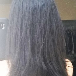 There is one random section of my hair on the left that is shorter than its right, causing a visible diagonal slope in the back of my head