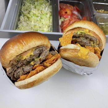 The Burger Truck Pontiac - two large hamburgers and a side of coleslaw - Food Trucks Near Me - Pontiac, Michigan The Burger Truck Pontiac - two large hamburgers and a side of coleslaw - Food Trucks Near Me - Pontiac, Michigan