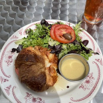 La Parisienne - Goat cheese, honey and tomato croissant with side salad - Cafes Near Me - Aiken, South Carolina La Parisienne - Goat cheese, honey and tomato croissant with side salad - Cafes Near Me - Aiken, South Carolina