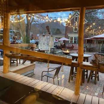 Boots Steakhouse - a patio with tables and chairs - Steakhouses Near Me - Dillsboro, North Carolina Boots Steakhouse - a patio with tables and chairs - Steakhouses Near Me - Dillsboro, North Carolina