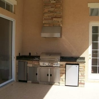 Creative Outdoor Kitchens - outdoor kitchen with stone finish - General Contractors Near Me - Tarpon Springs, Florida Creative Outdoor Kitchens - outdoor kitchen with stone finish - General Contractors Near Me - Tarpon Springs, Florida
