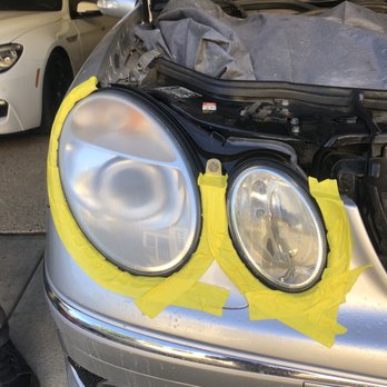 Vivid Headlight - Prep work to protect your cars paint (*notice the yellow tape which is softer on your paint finish) - Auto Detailing Near Me - Costa Mesa, California Vivid Headlight - Prep work to protect your cars paint (*notice the yellow tape which is softer on your paint finish) - Auto Detailing Near Me - Costa Mesa, California