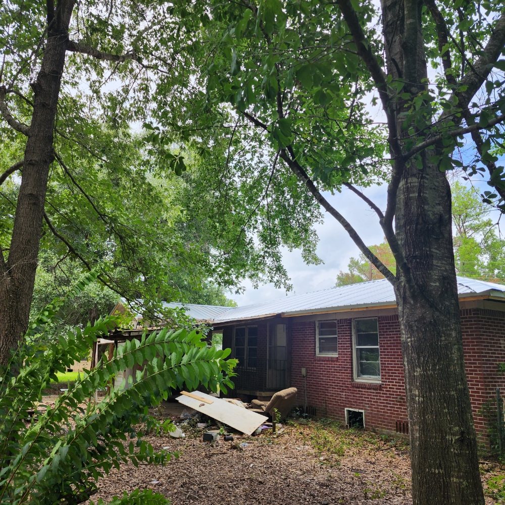 Slide of Flournoy and Sons Roofing