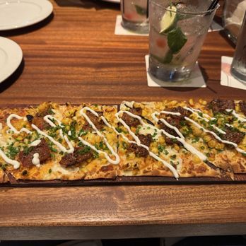 Seasons 52 - Grilled corn and spicy bacon flatbread. - New American Near Me - Sarasota, Florida Seasons 52 - Grilled corn and spicy bacon flatbread. - New American Near Me - Sarasota, Florida