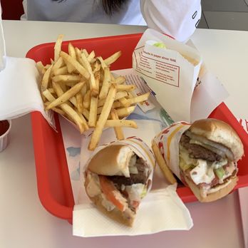 In-N-Out Burger - Hamburger, whole grilled onion, cut in half with fries well done. - Burgers Near Me - Austin, Texas