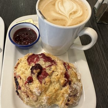 Poppies - Raspberry scone, raspberry jam, oat latte - Delis Near Me Poppies - Raspberry scone, raspberry jam, oat latte - Delis Near Me