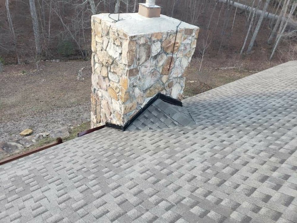 Slide of Real Deal Roofing