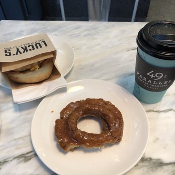 49th Parallel Coffee - Salted caramel donut and breakfast sandwich - Coffee & Tea Near Me - Vancouver, British Columbia 49th Parallel Coffee - Salted caramel donut and breakfast sandwich - Coffee & Tea Near Me - Vancouver, British Columbia