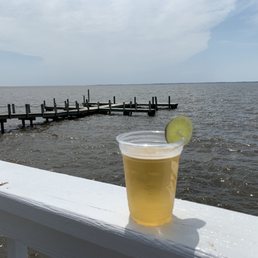 View from outside tables. Nice local draft lager brewed by a group of ex green berets.