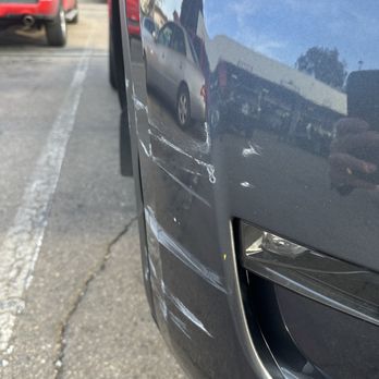Evans Tire & Service Centers - Bent trim that needs replaced - Tires Near Me - Encinitas, California Evans Tire & Service Centers - Bent trim that needs replaced - Tires Near Me - Encinitas, California