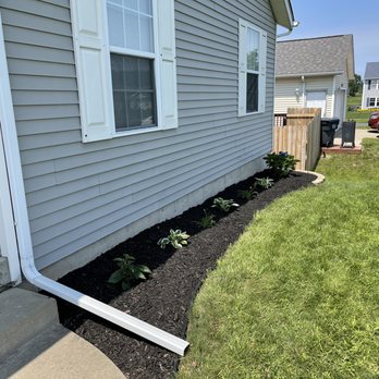 Wenke Lawn Care - After: cleaned out this bed added some perennials and new mulch - Lawn Services Near Me Wenke Lawn Care - After: cleaned out this bed added some perennials and new mulch - Lawn Services Near Me